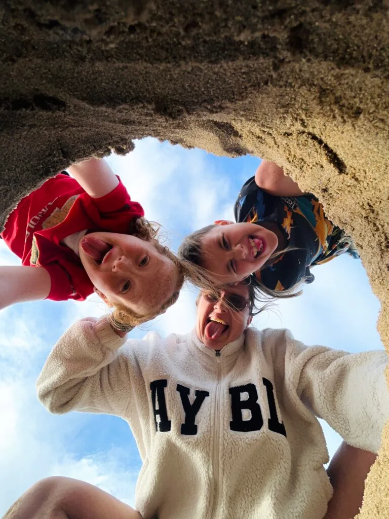 Cambridge wedding photographer Polly Hart with her kids at beach
