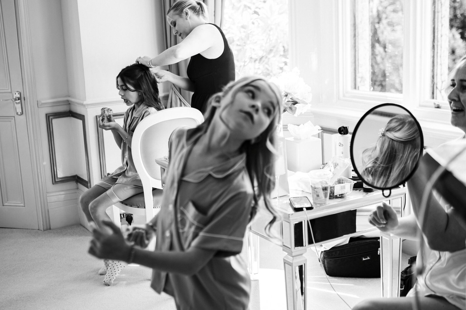 Bride getting ready at Holmewood Hall wedding in Cambridgeshire
