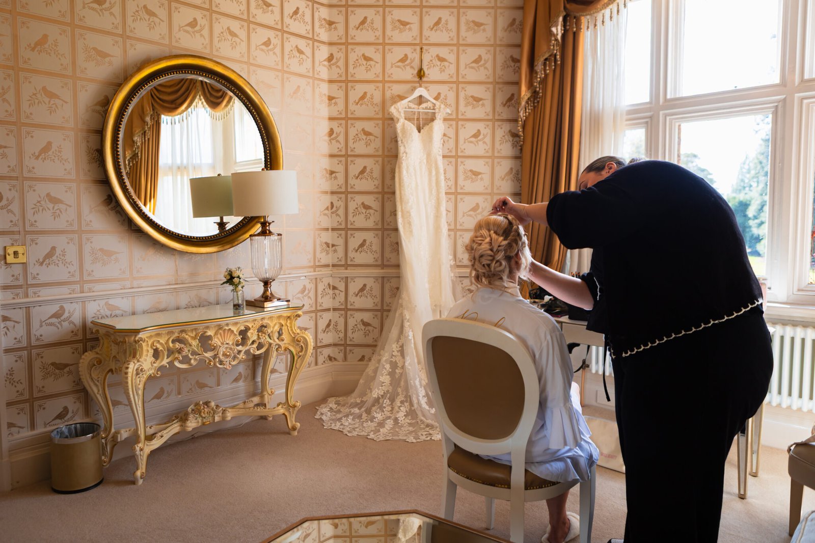 Bride getting ready at Holmewood Hall wedding in Cambridgeshire