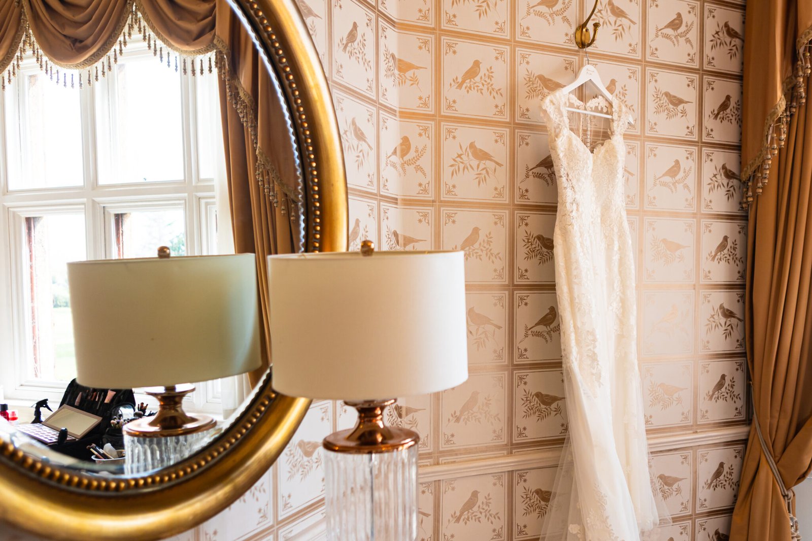 Bride getting ready at Holmewood Hall wedding in Cambridgeshire