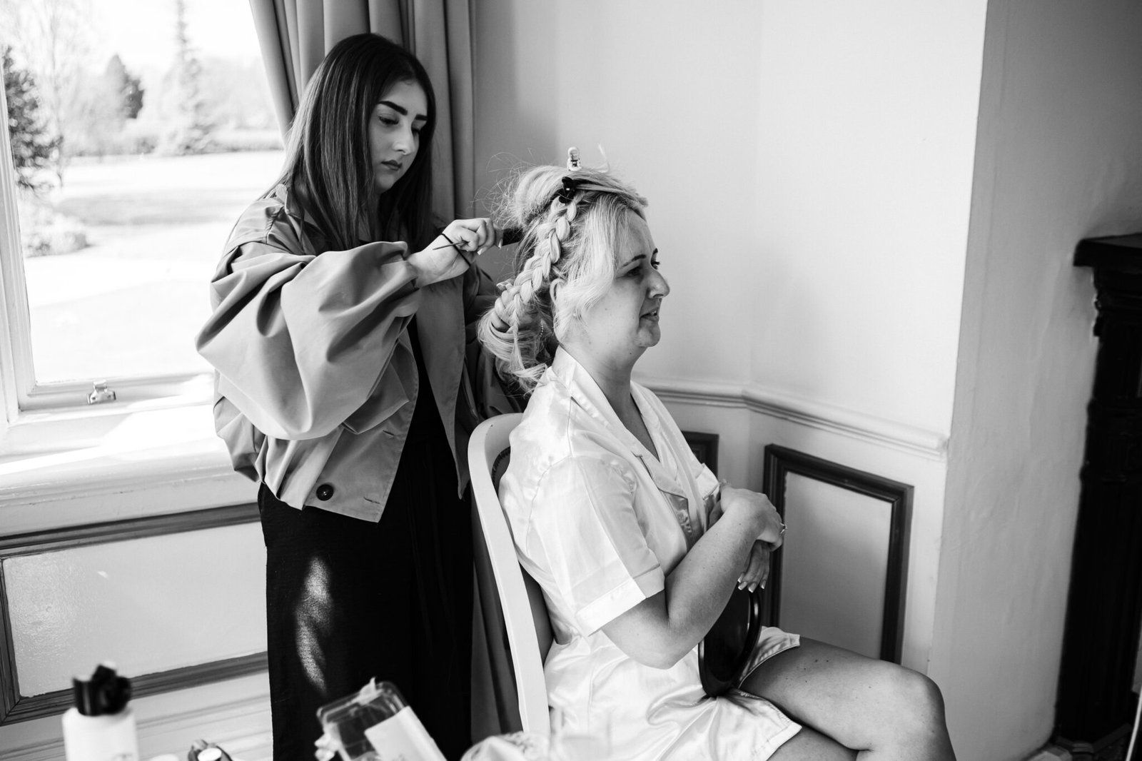 Bride getting ready at Holmewood Hall wedding in Cambridgeshire